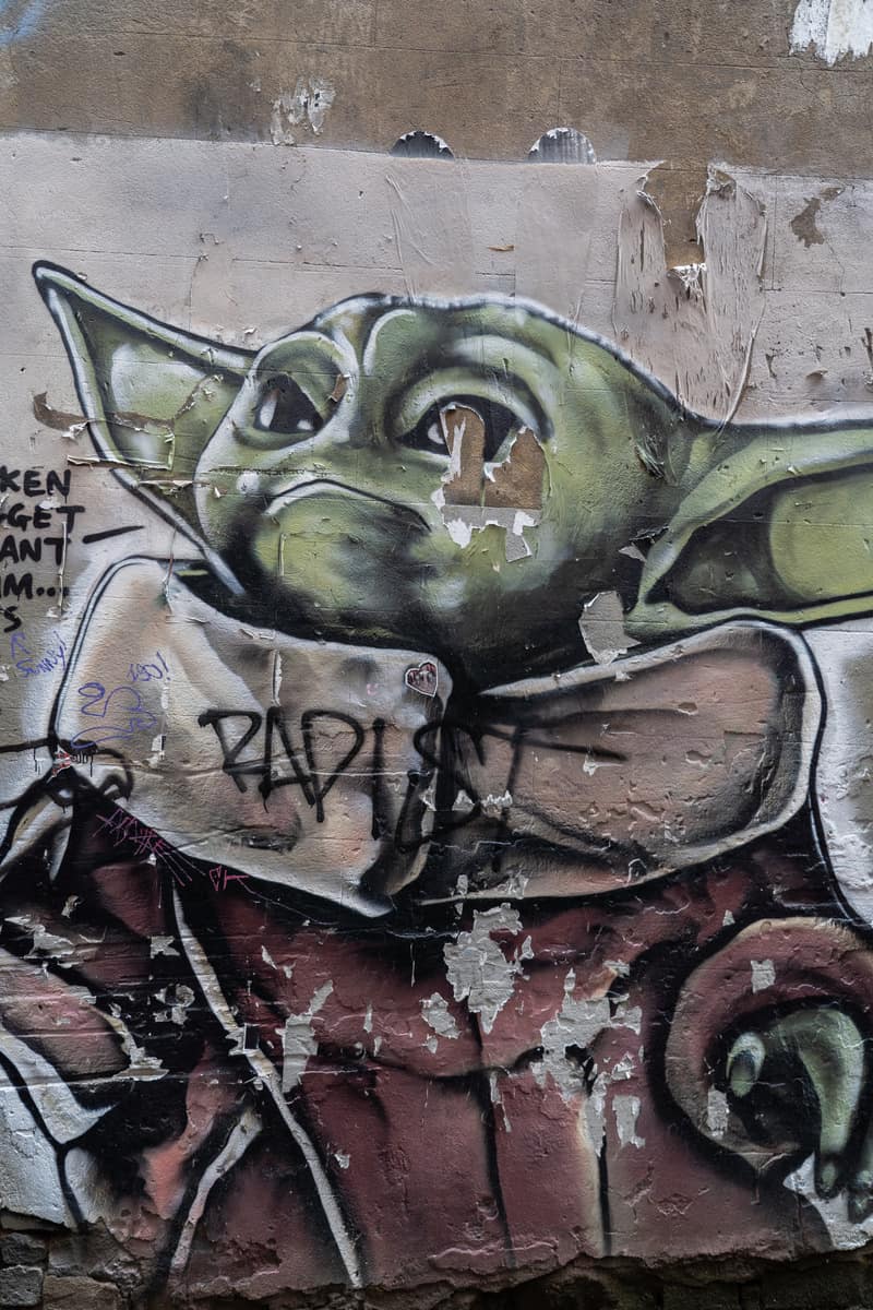Spray-painted mural of Baby Yoda