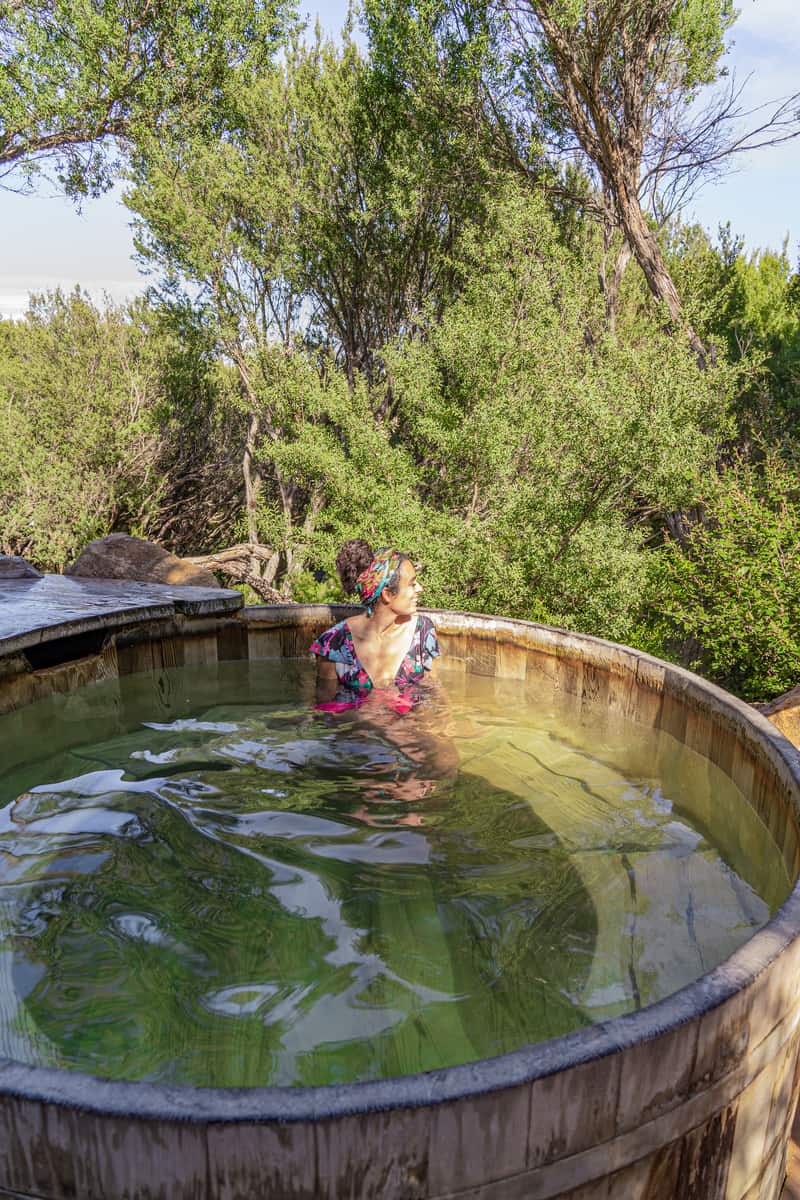 Woman sitting in a plunge pool