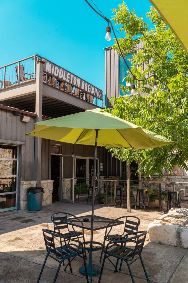 Covered outdoor patio table & chairs