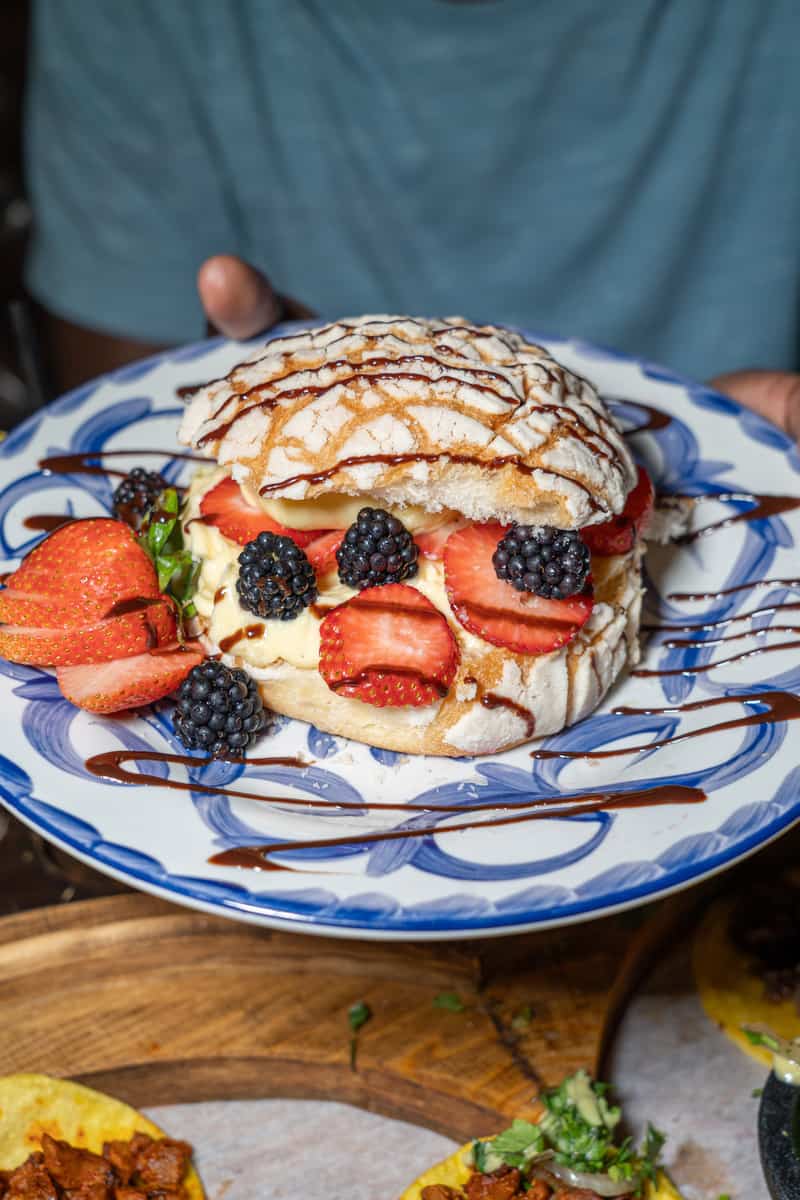 Filled concha with fresh berries