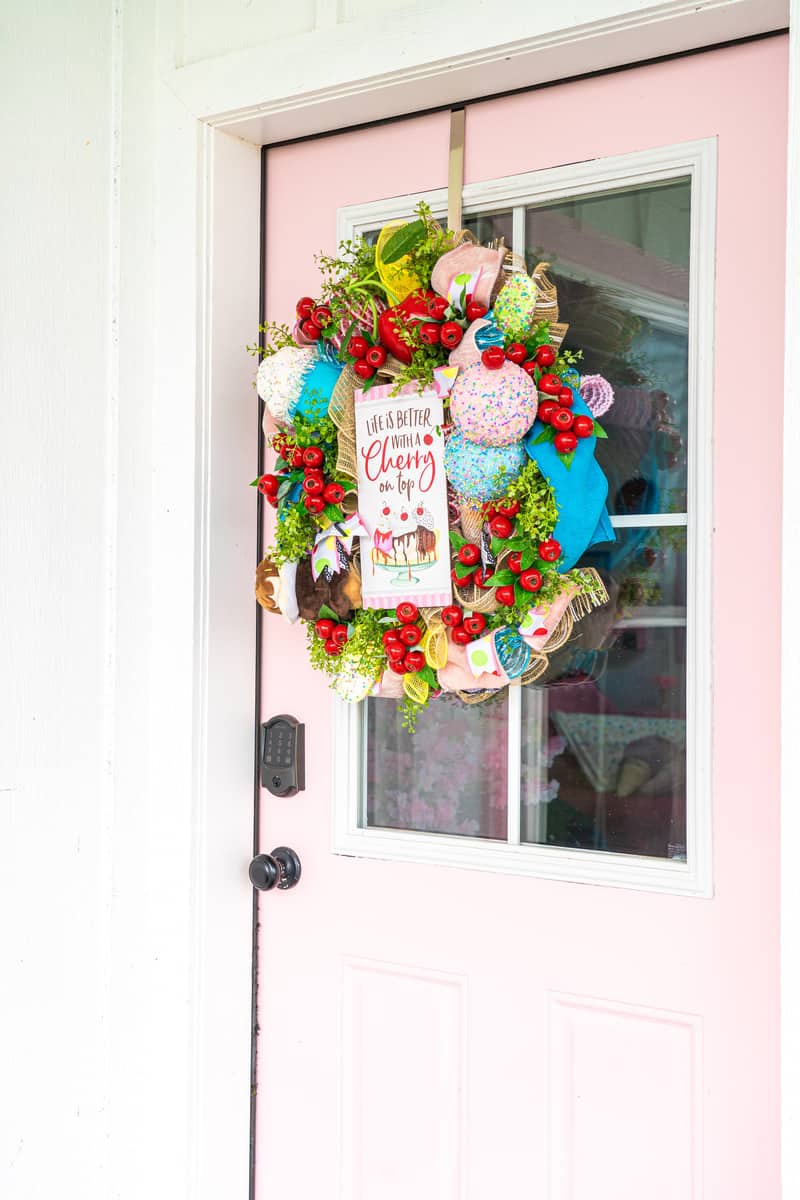 ice cream wreath on pink door