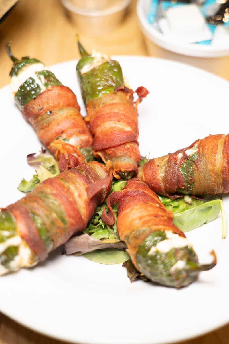 Chili pepper rolled with bacon.