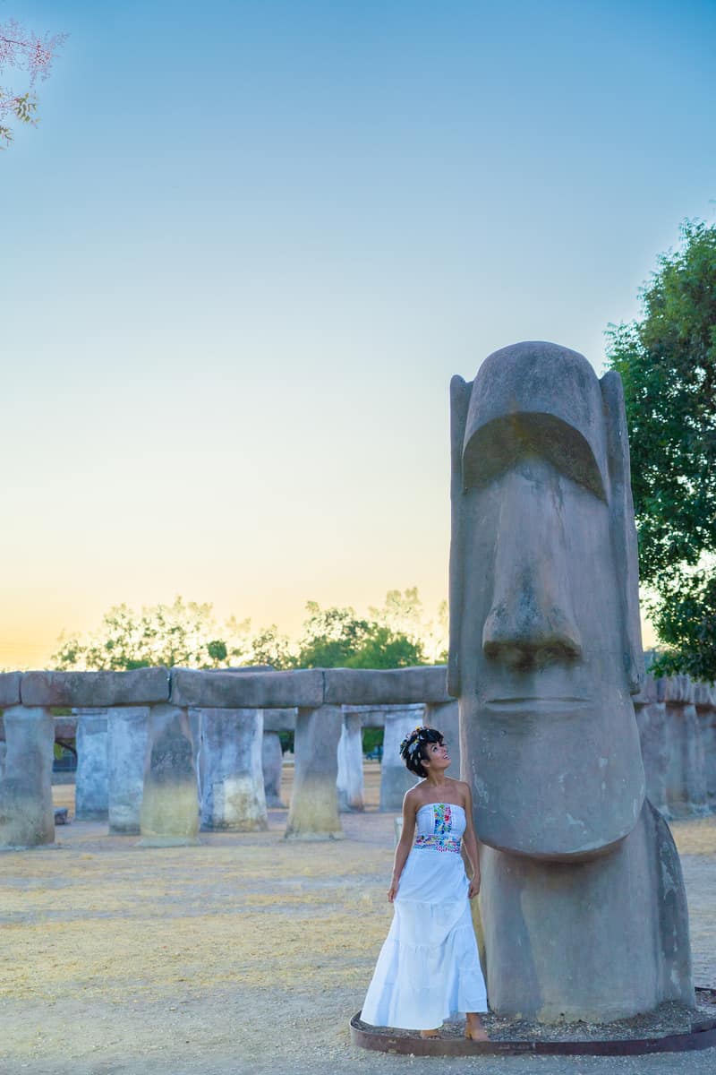 A woman leaning beside Stonehenge II