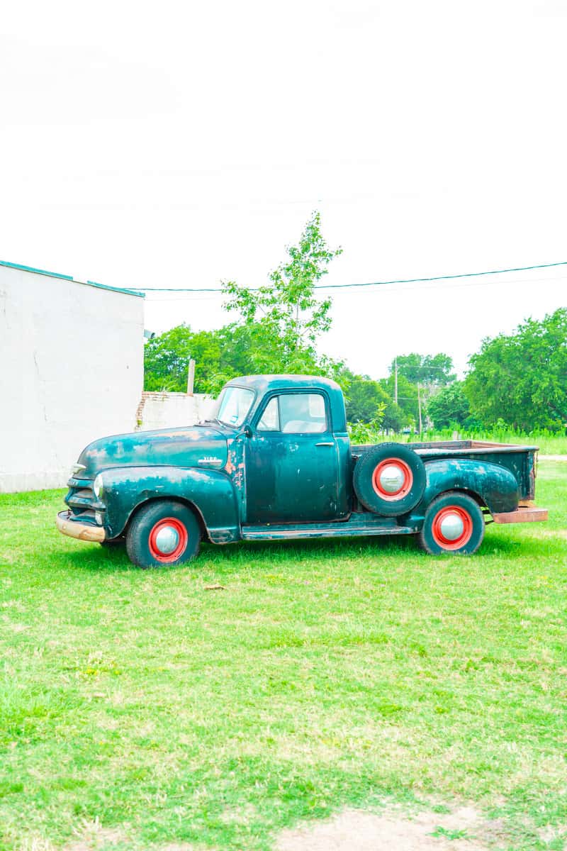 A blue vintage truck.