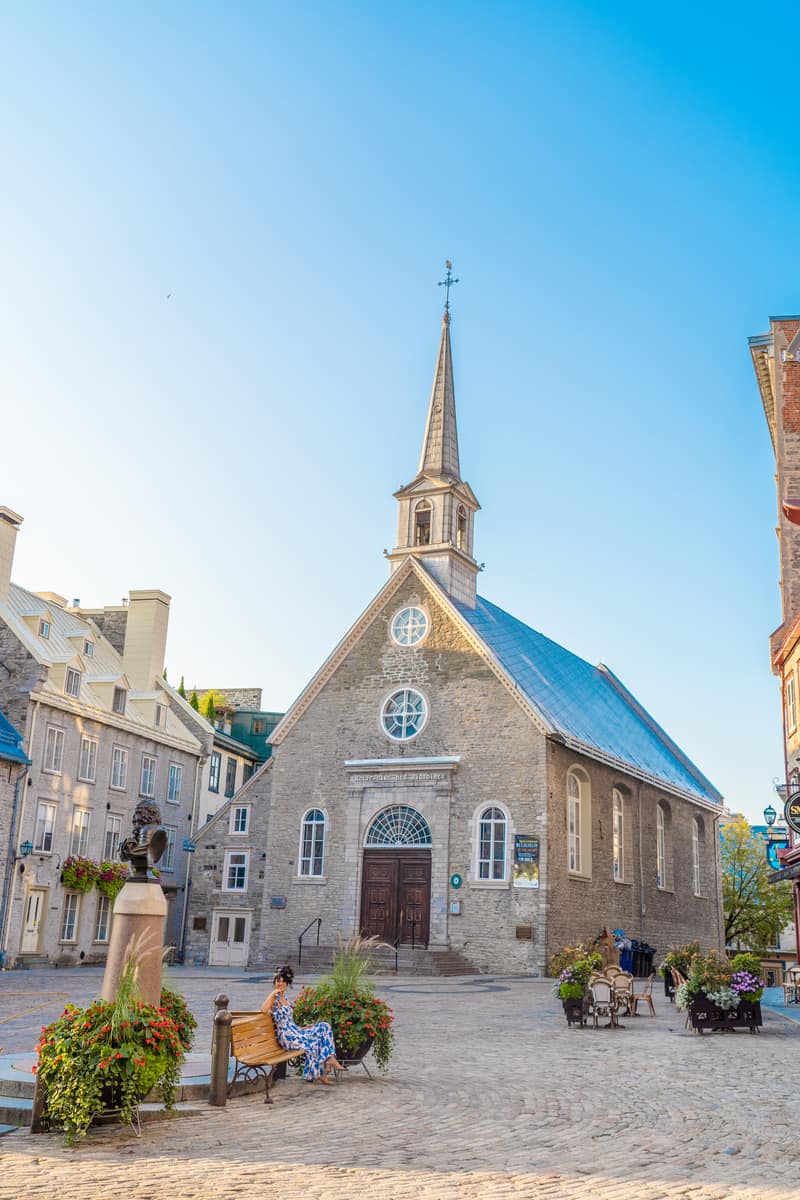 The iconic Notre-Dame-des-Victoires Church, the oldest stone church in North America,