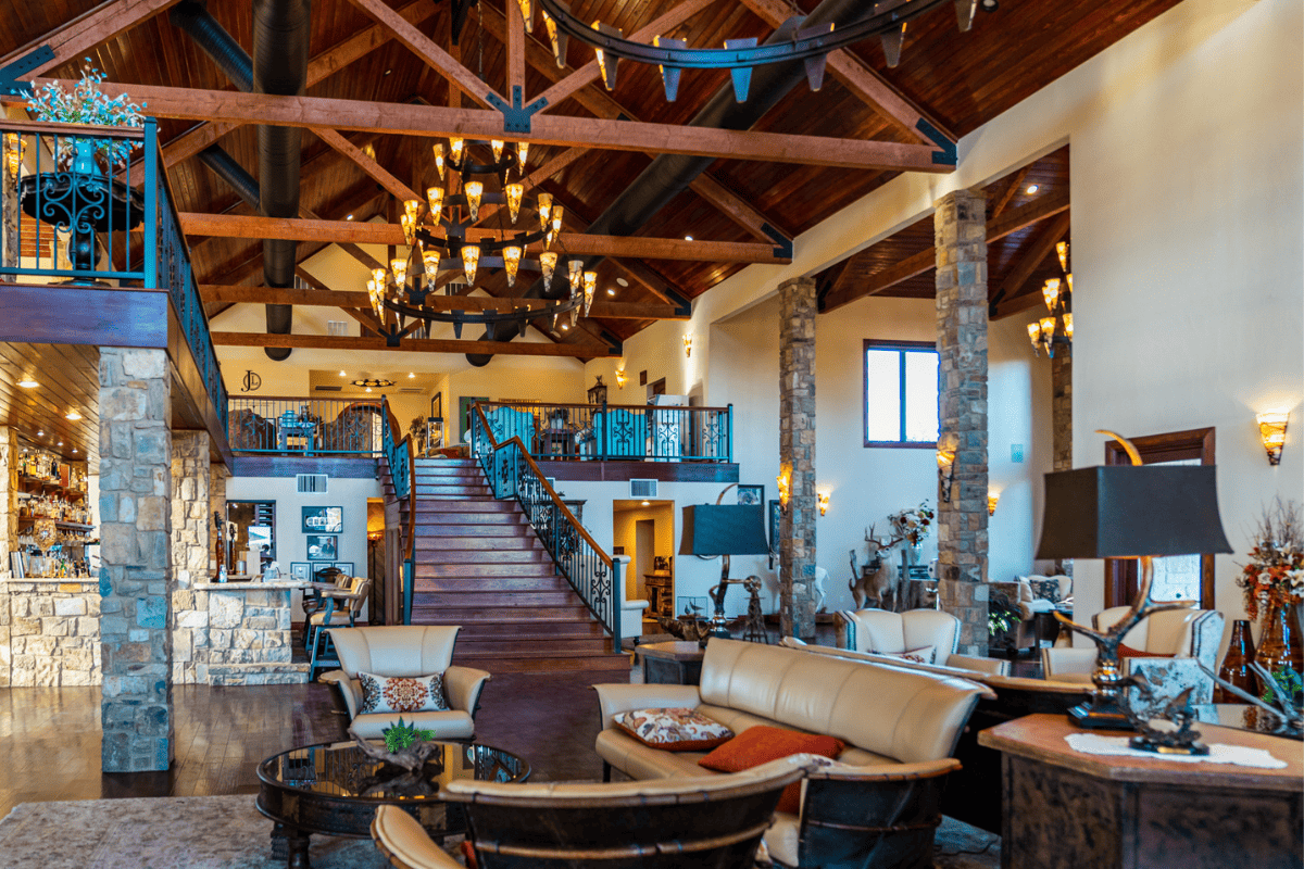 Two-story cabin covered in outdoor and hunting decor