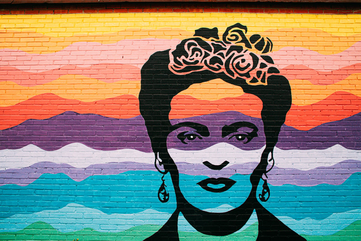 a mural of a person with flowers on her head