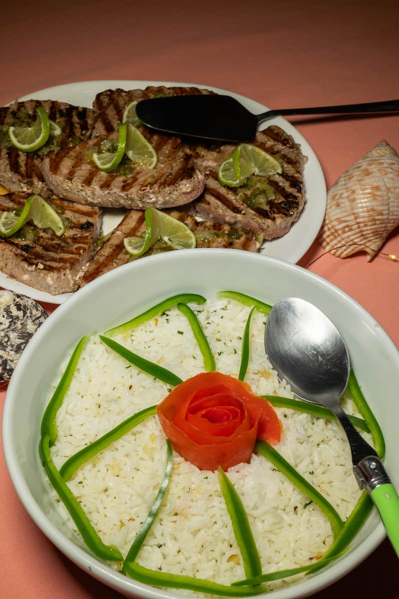 a plate of food with a flower design on it