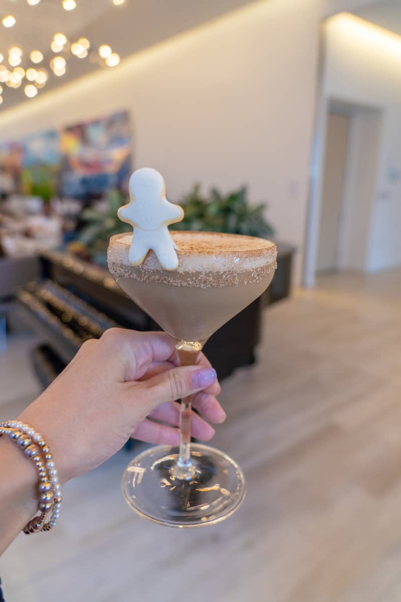 A holiday drink with gingerbread on top