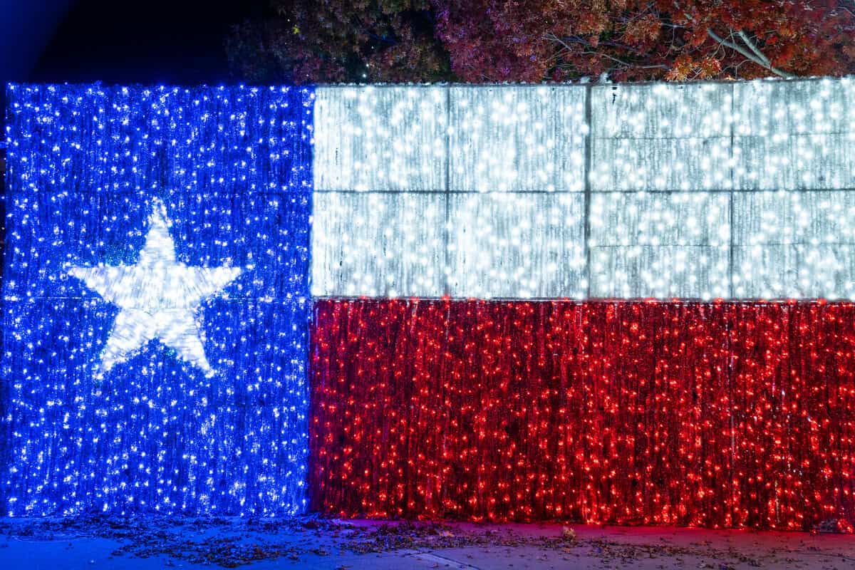 A wall with hanging lights in the design of the Texas state flag