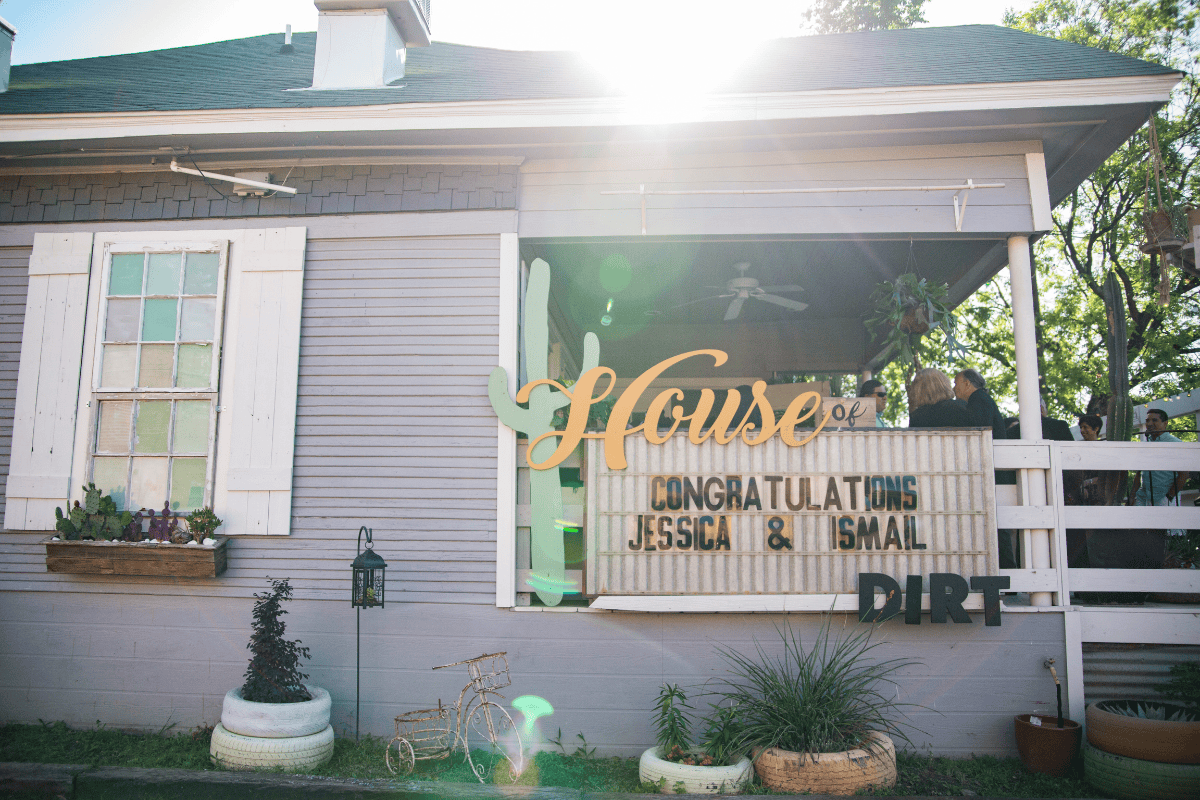 Exterior of a rustic house with a covered porch