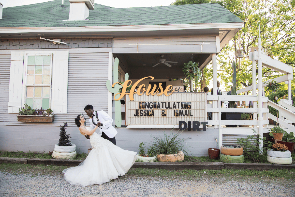 A bride and a groom sharing a romantic kiss 