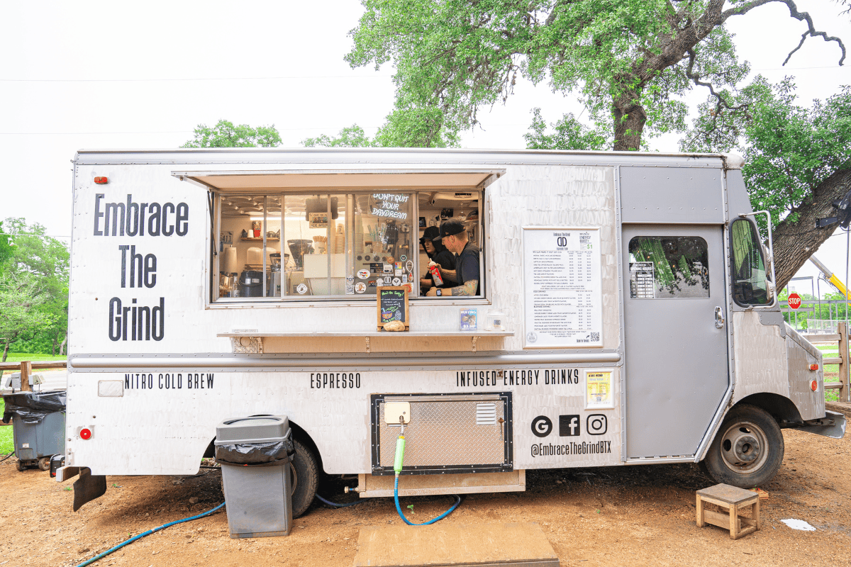 a food truck with people in it