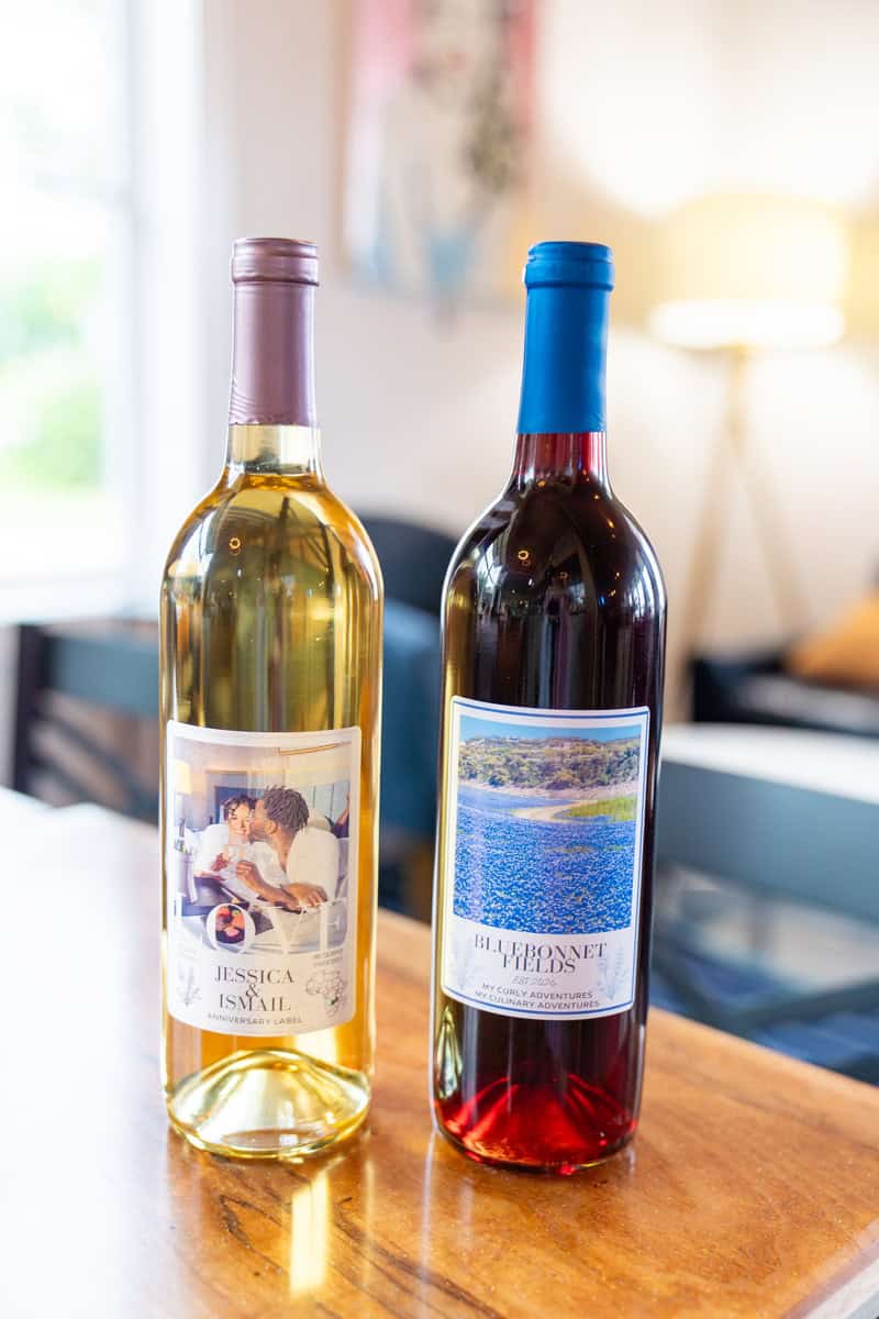 two bottles of wine on a table