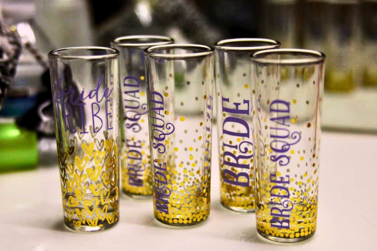 Gold and purple shot glasses