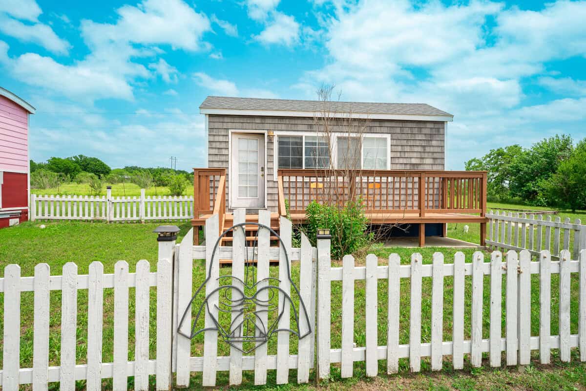 a house with a white picket fence