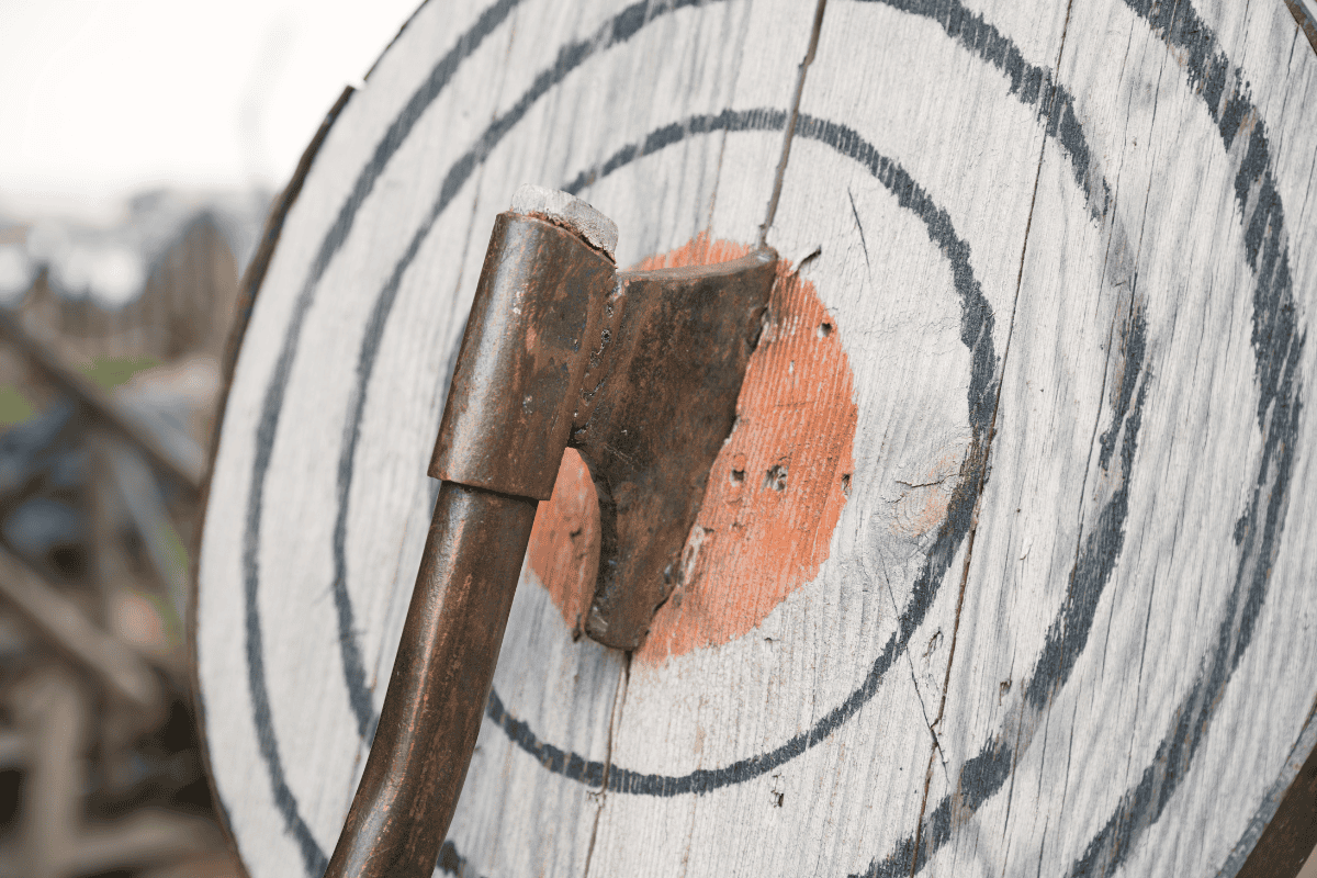 an axe stuck in a target