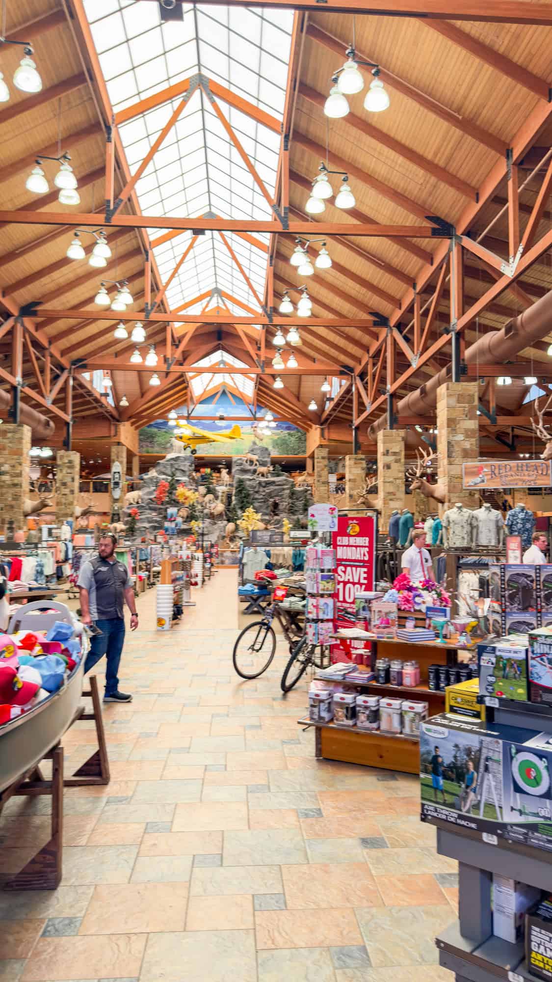 a large store with a man and a bicycle