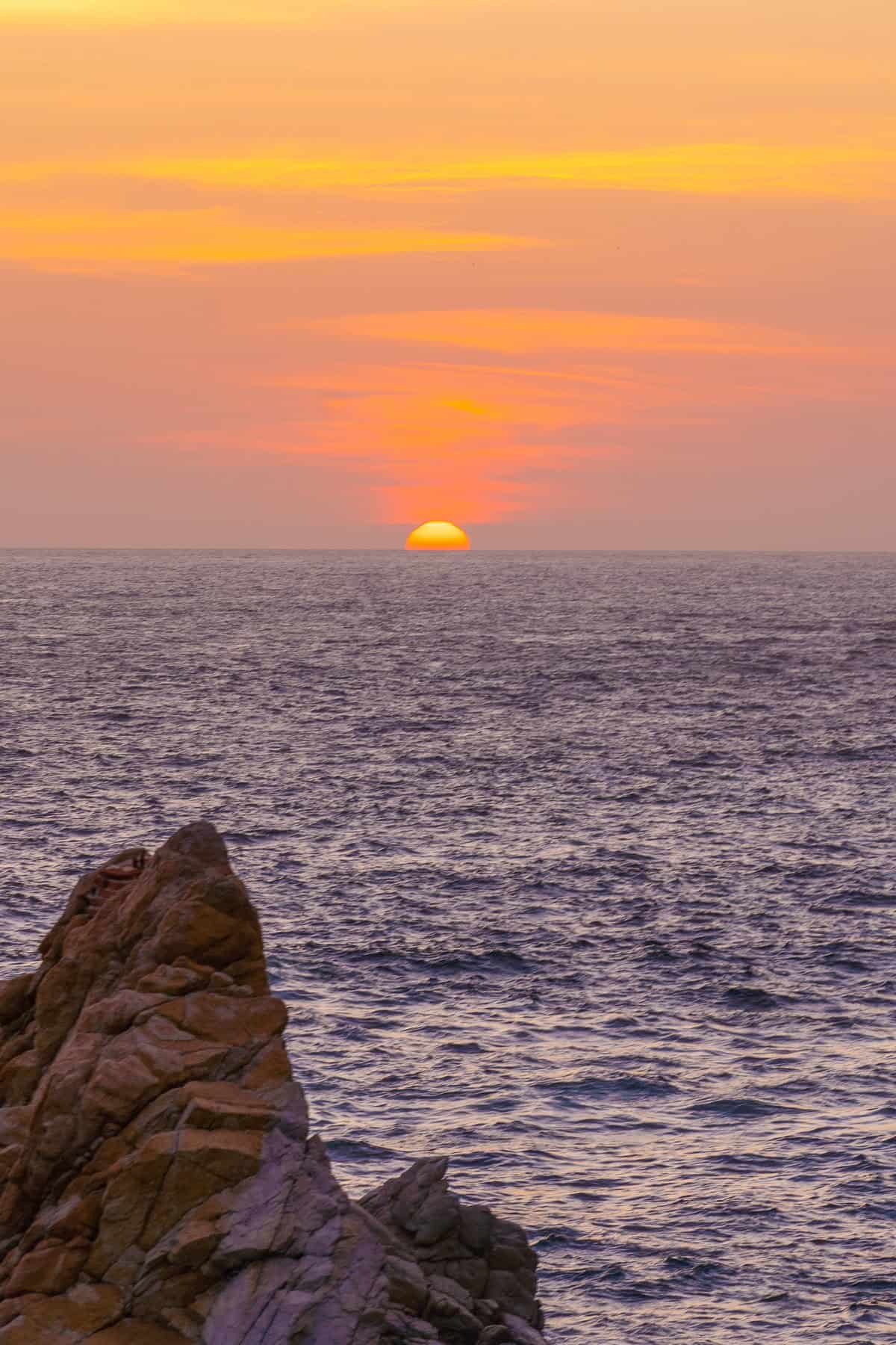 a sunset over the ocean