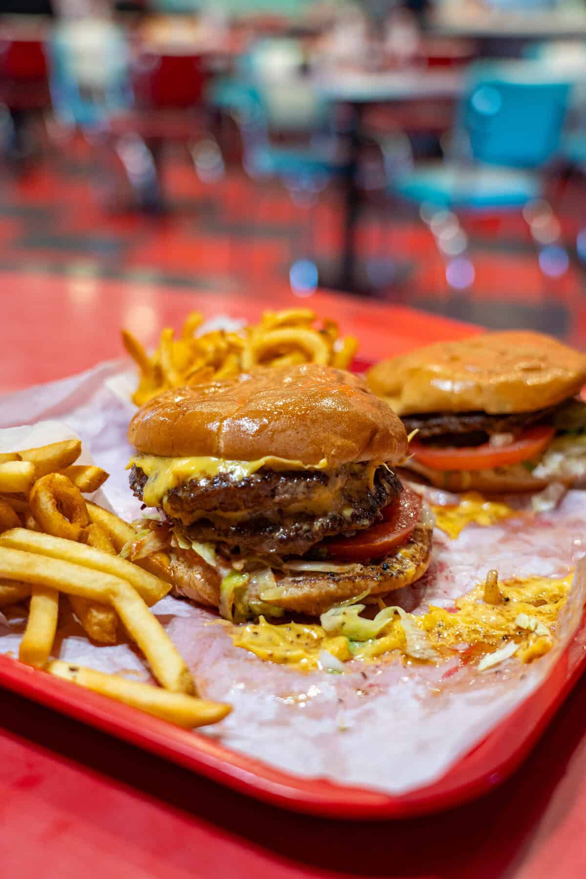 a burgers and fries on a tray