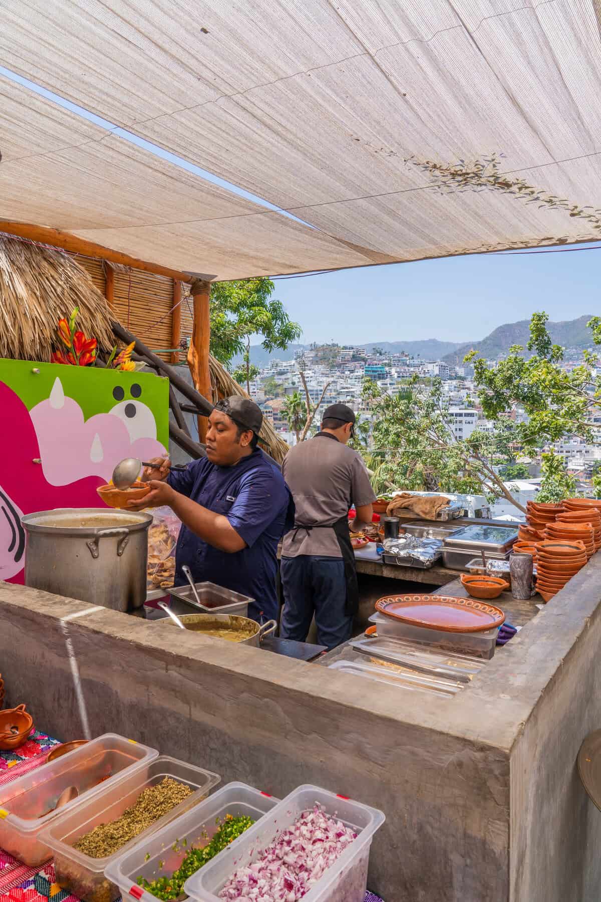 a group of people cooking outside