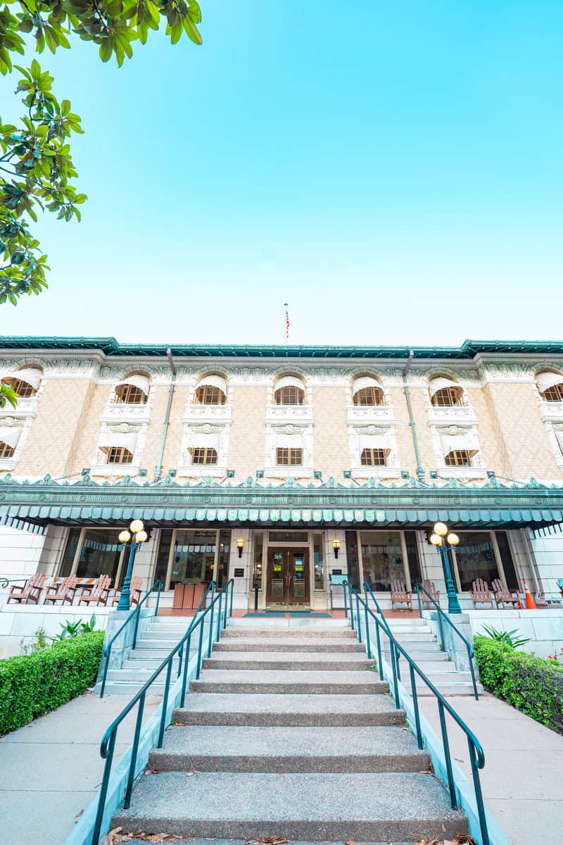 a building with stairs leading to the entrance