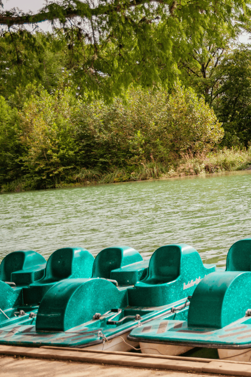 Paddle boats on the water.