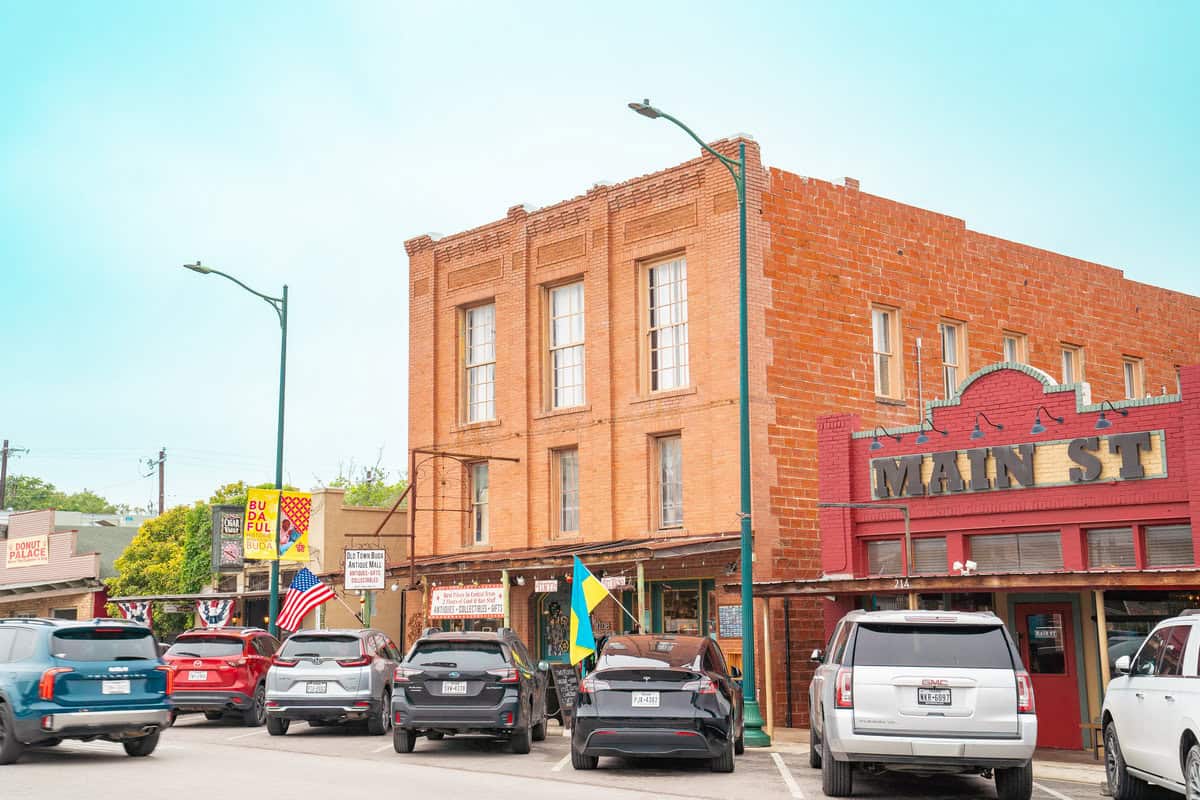 a building with cars parked in front of it