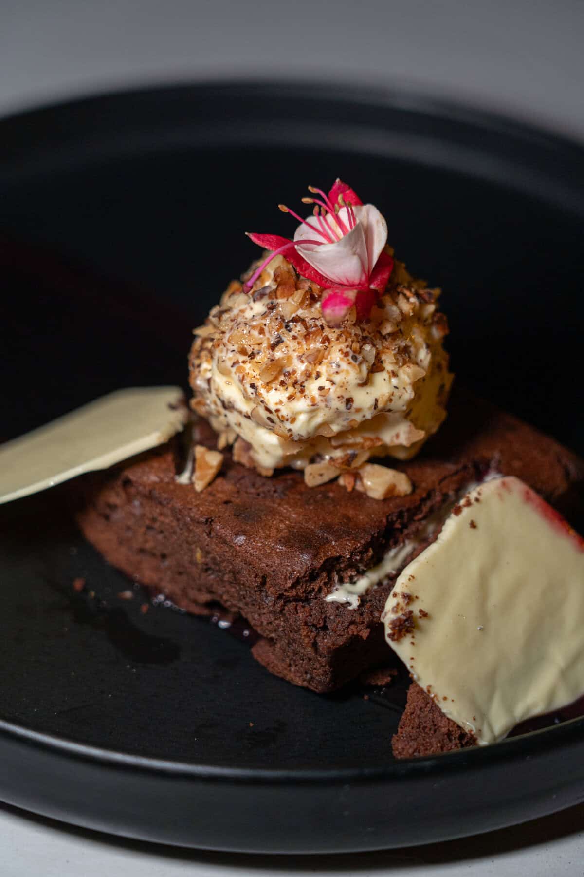 a brownie with a scoop of ice cream on top