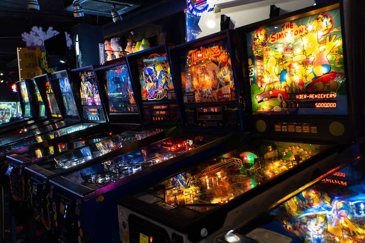 a row of pinball machines