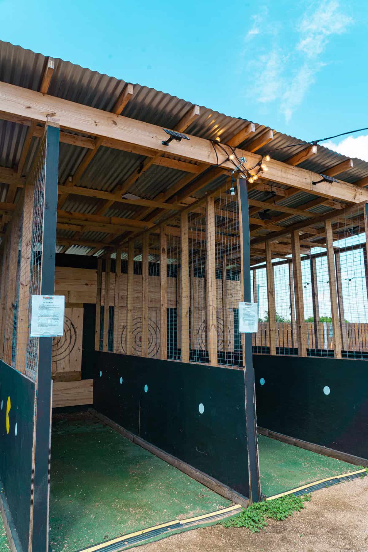 a wooden structure with a hole in the wall