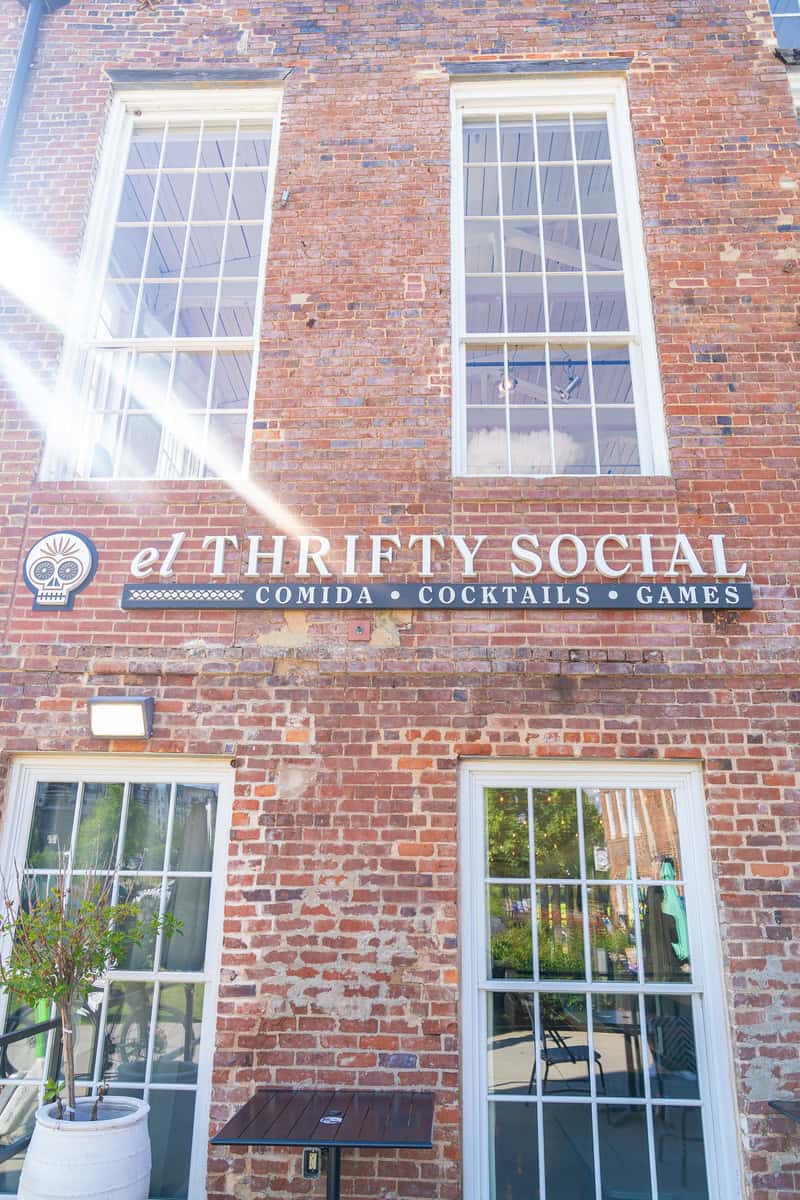 a building with windows and a sign