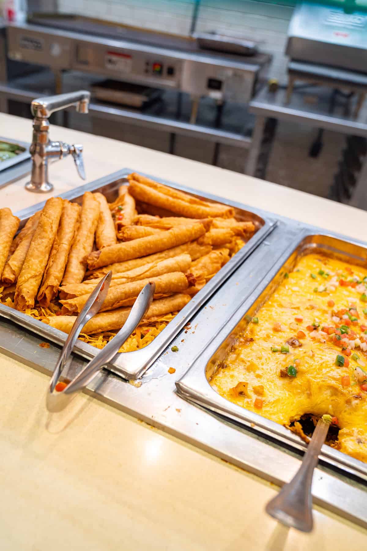 a trays of food on a counter