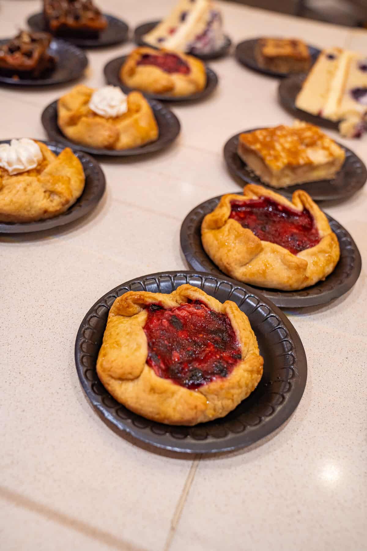 a group of pastries on plates