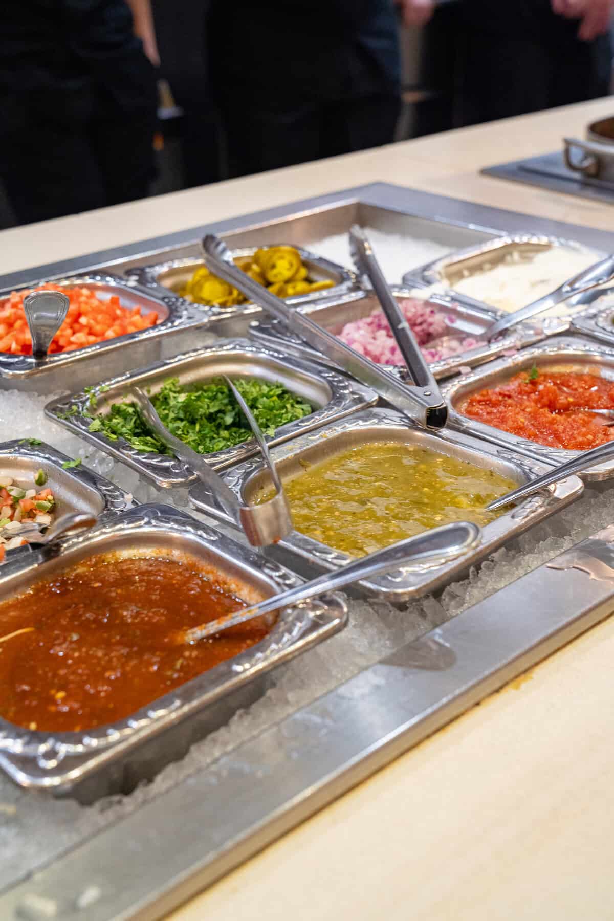 a trays of food on a counter