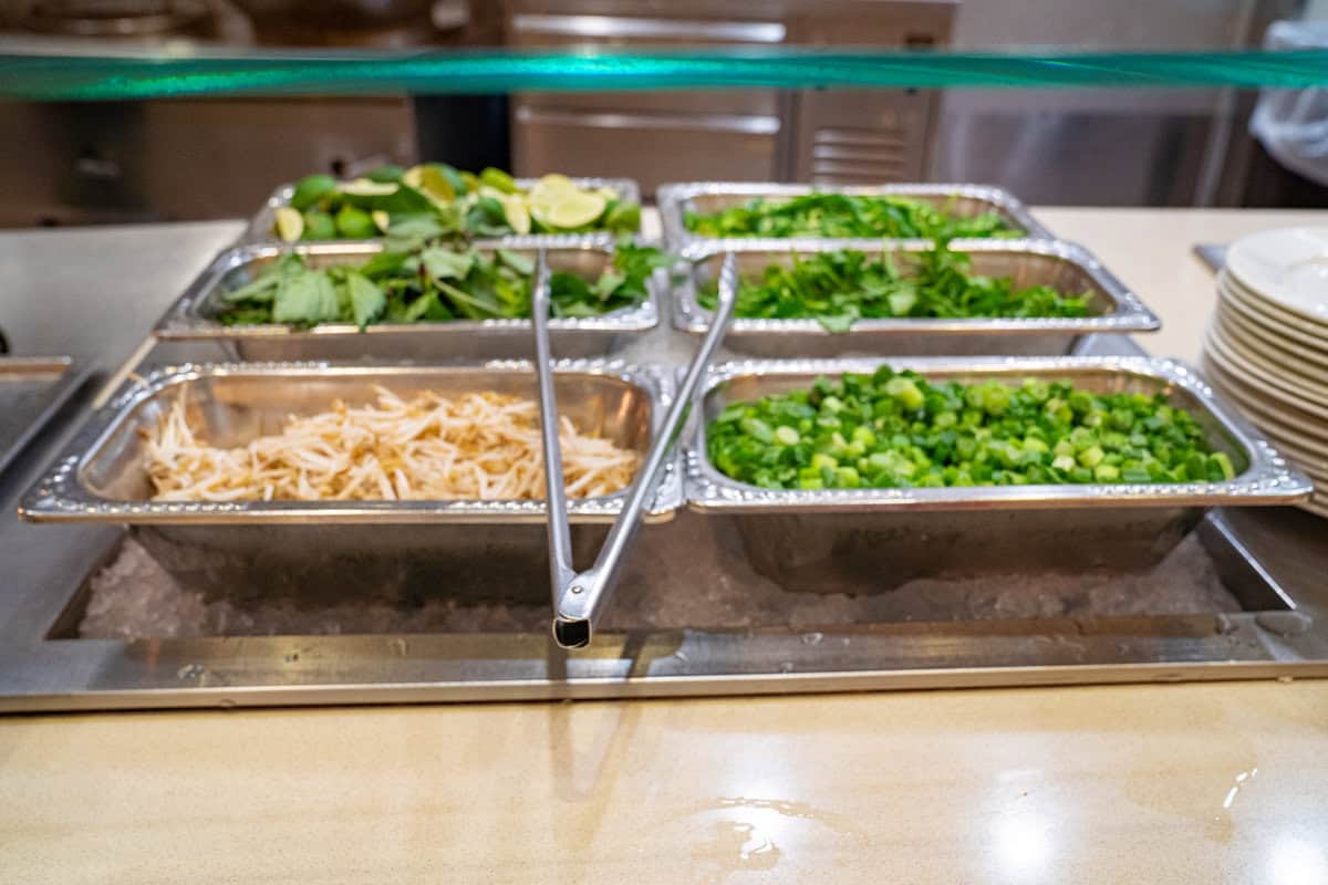 a trays of food on a counter