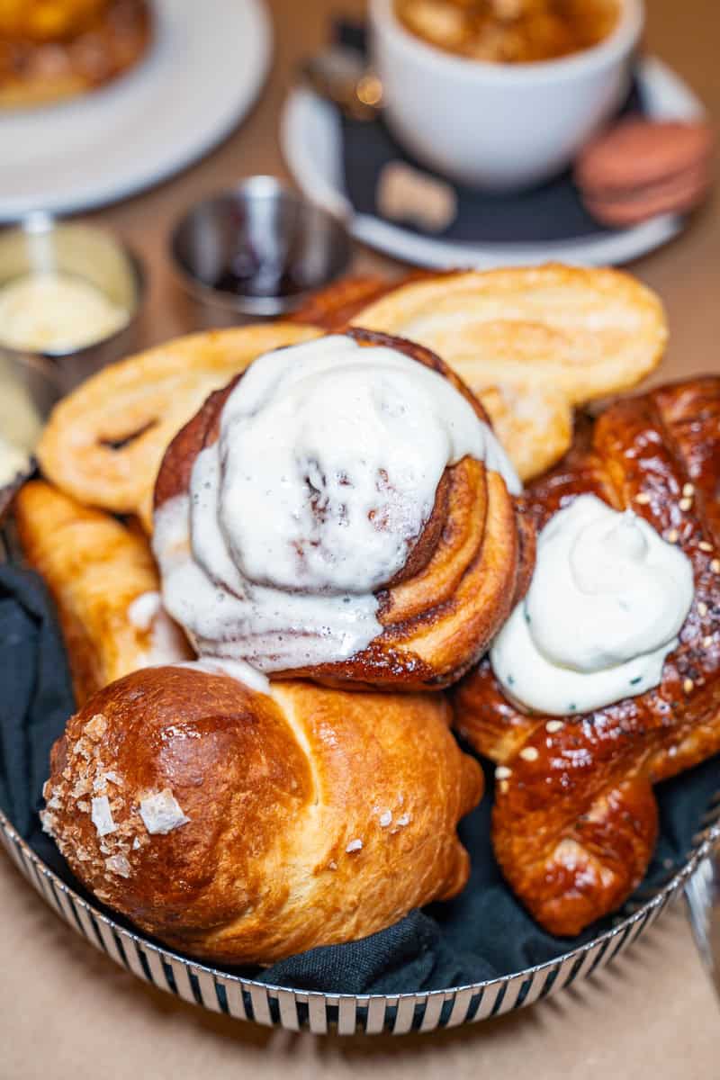 a group of pastries in a basket