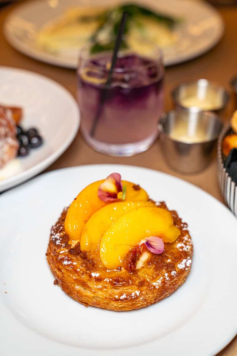 a plate of food with fruit on top