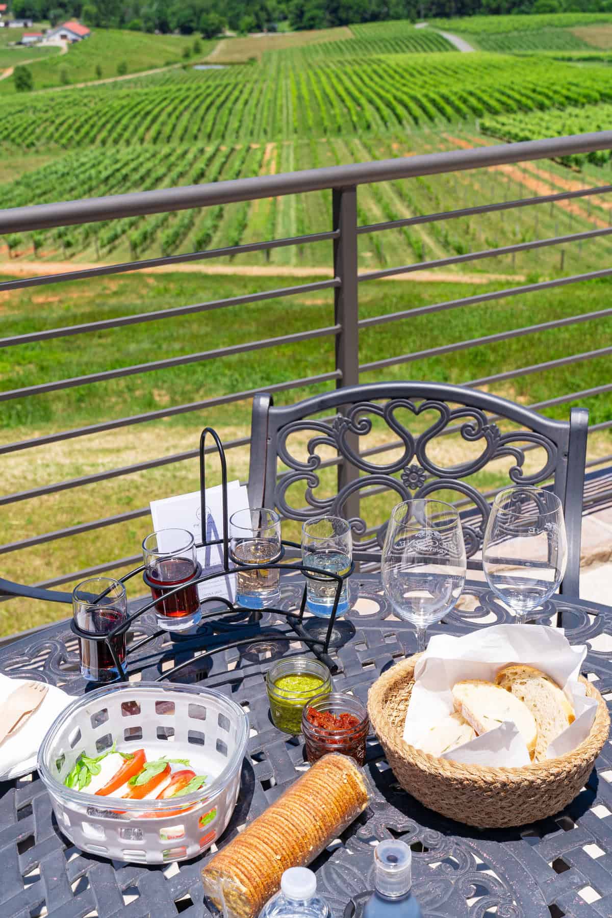 a table with food and wine glasses on it