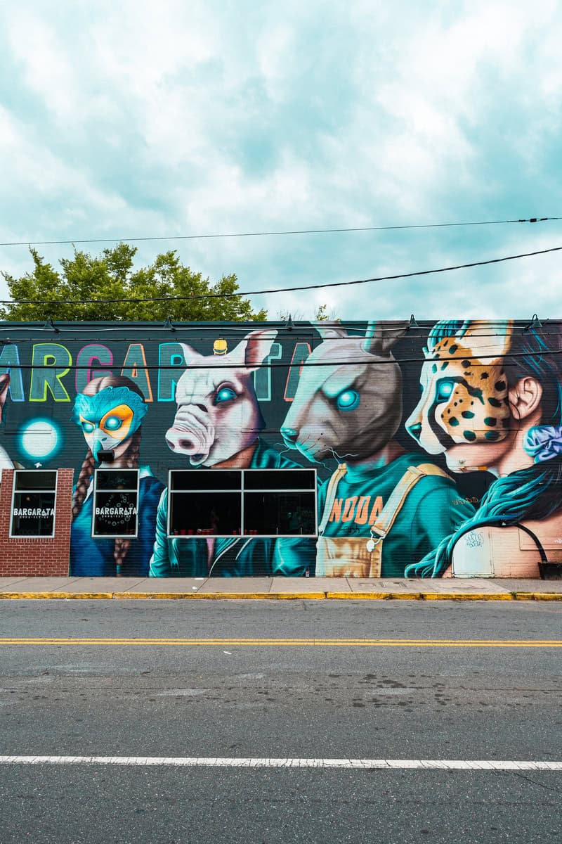 a mural of animals on a building