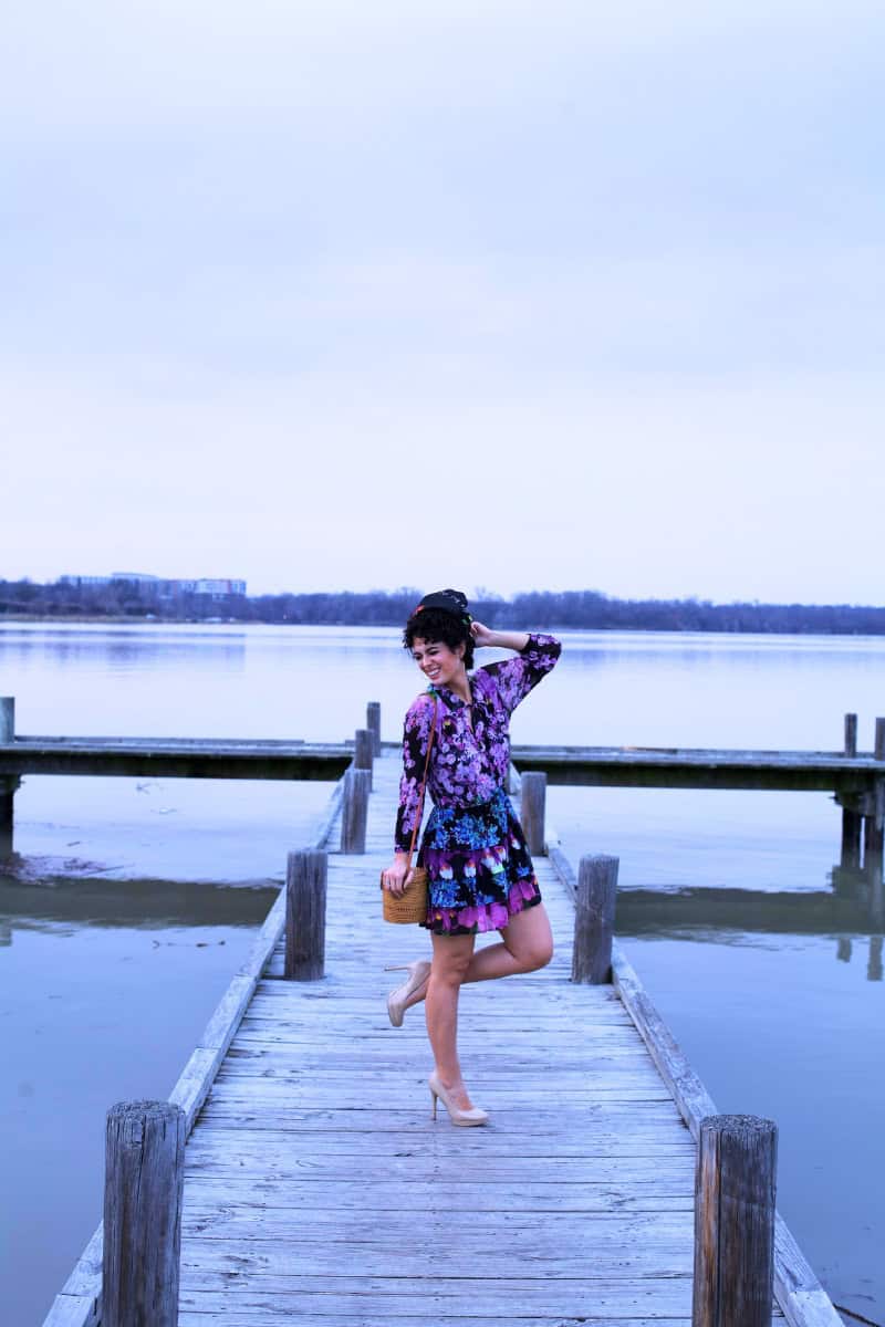 a woman posing on a dock