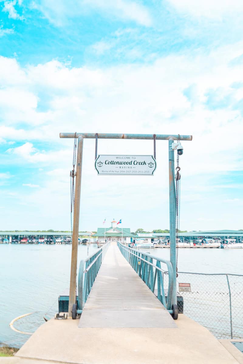 A bright walkway leading to Cottonwood Creek Marina