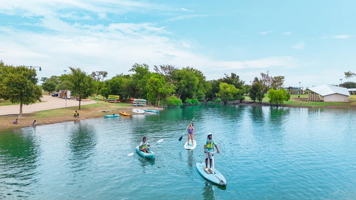 People kayaking and paddleboarding