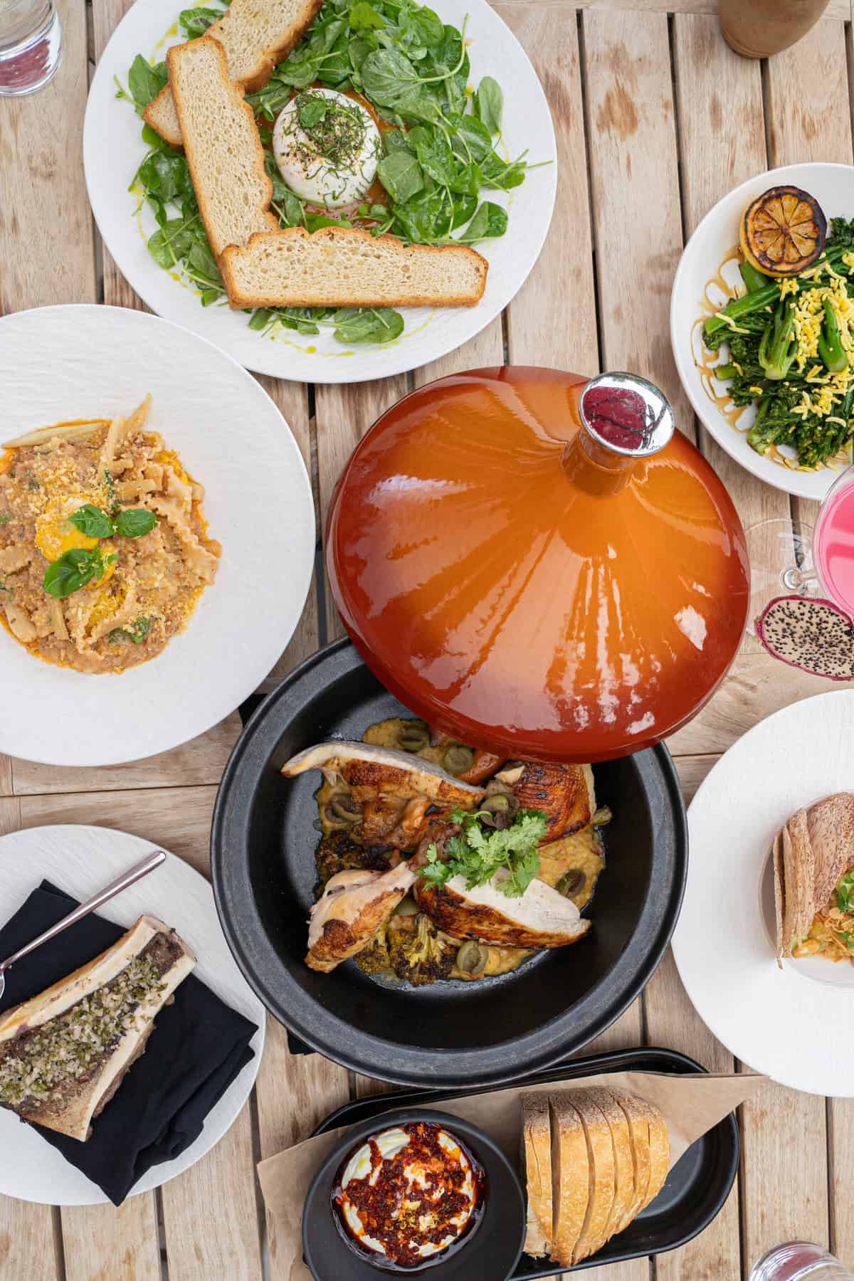 Variety of dishes on a wooden table