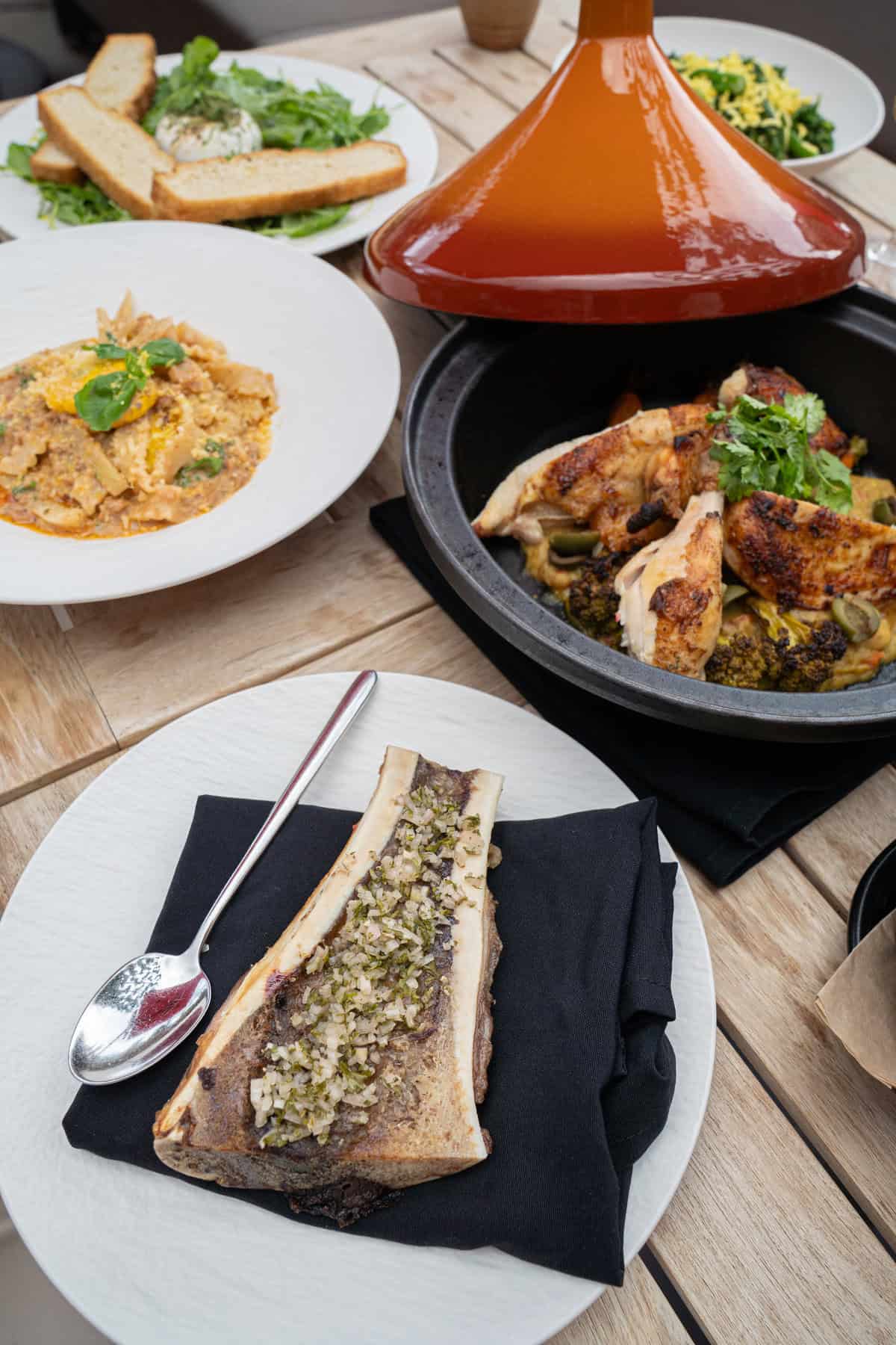 Variety of dishes on a wooden table