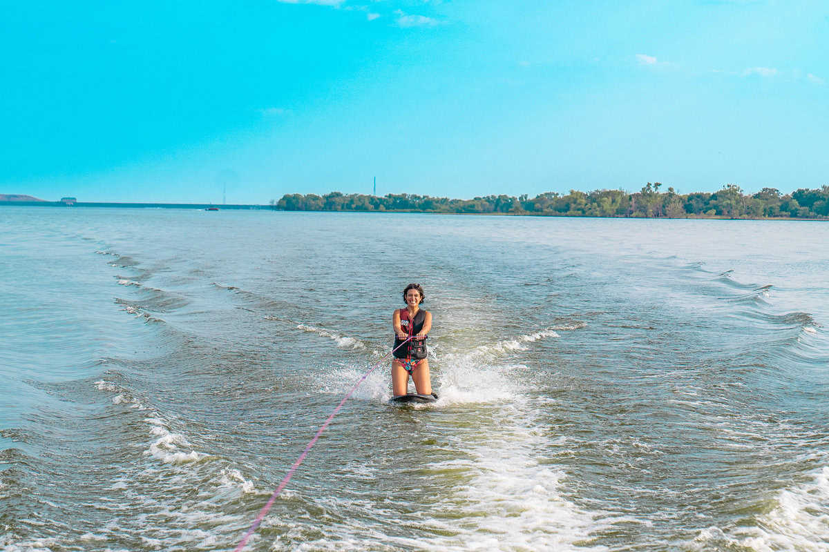 Person water skiing on a calm lake