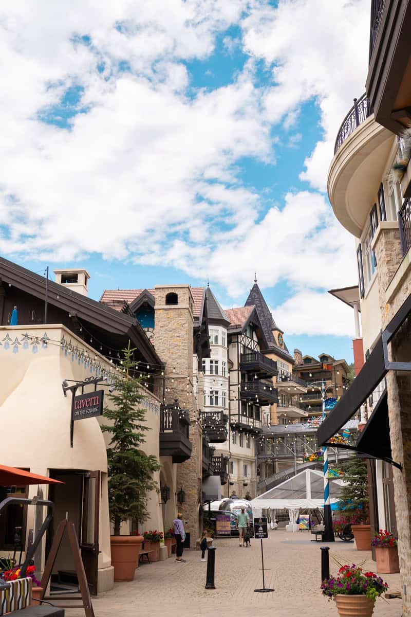 European-style buildings line a cobblestone street