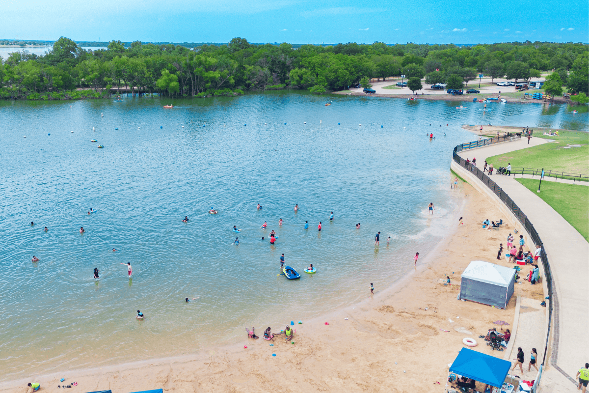 Aerial view of a busy lakeside beach