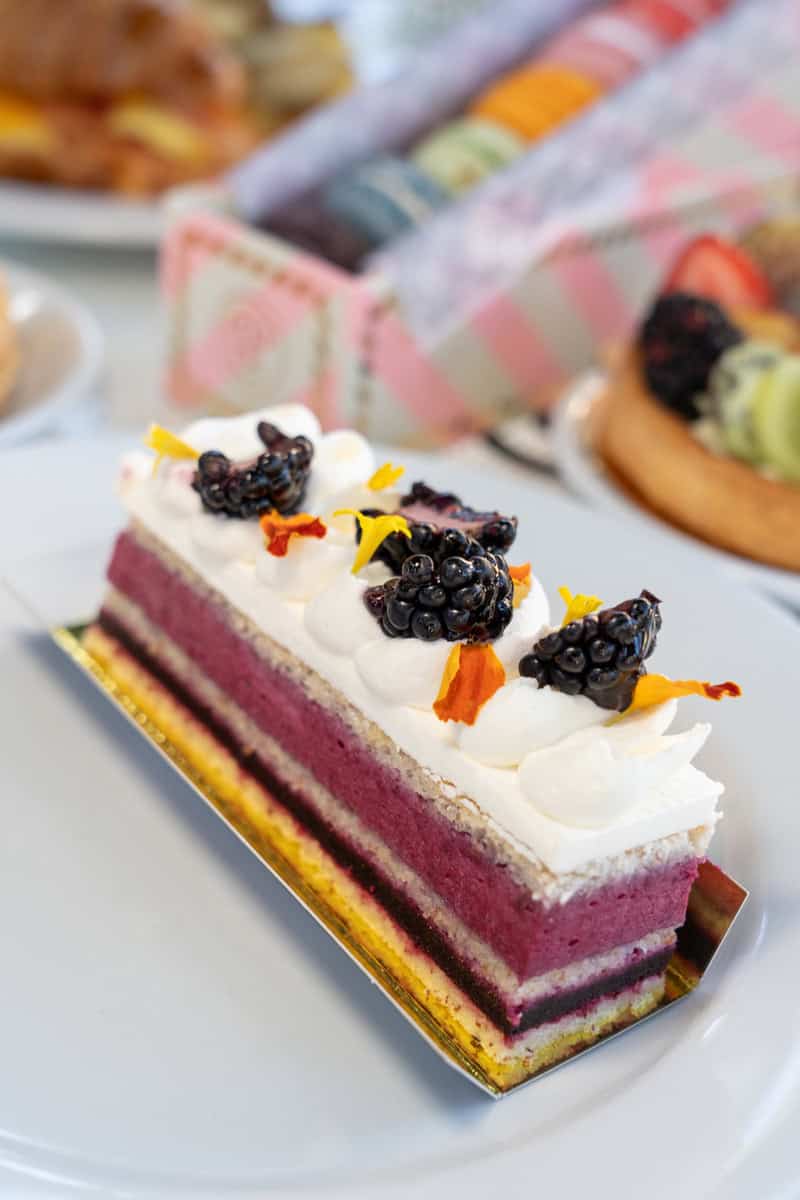 A slice of layered berry cake