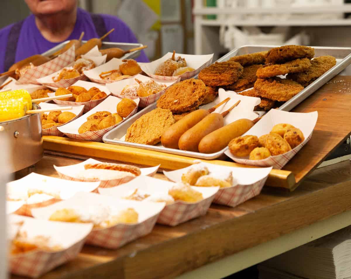 Variety of fried foods displayed on a counter